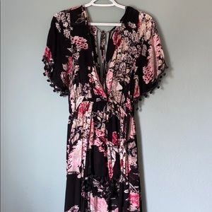 Black floral romper with long tail
